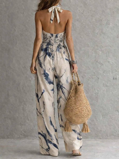 Jumpsuit con cuello halter y estampado tinta